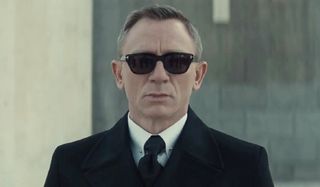 Spectre Daniel Craig wearing sunglasses as James Bond