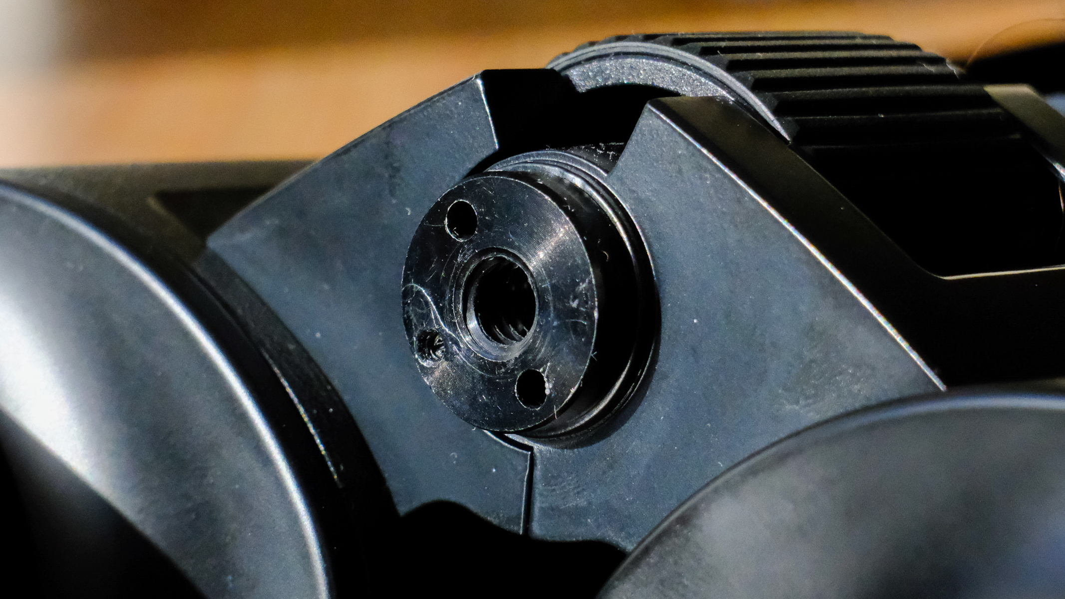 The tripod adapter socket on the Nikon Action Zoom 10-22x50 binoculars.