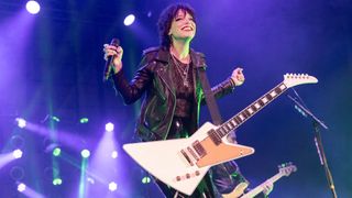 Lzzy Hale of Halestorm performs on stage at The SSE Hydro on November 24, 2019 in Glasgow, Scotland.
