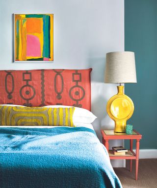 Colorful bedroom with fabric headboard