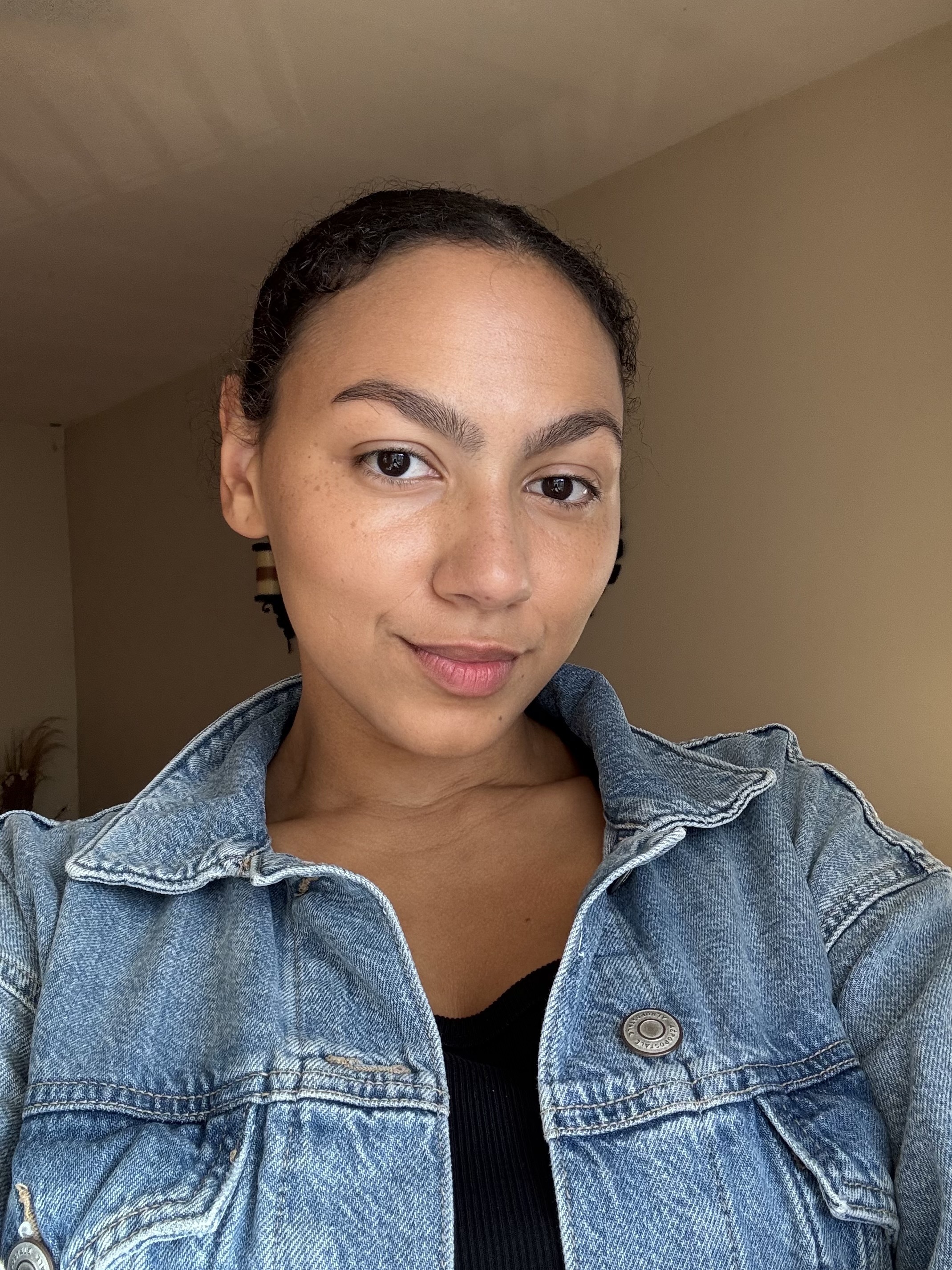 Who What Wear assistant beauty editor Sabrina Talbert wearing the Live Tinted HUESTICK Complexion Stick