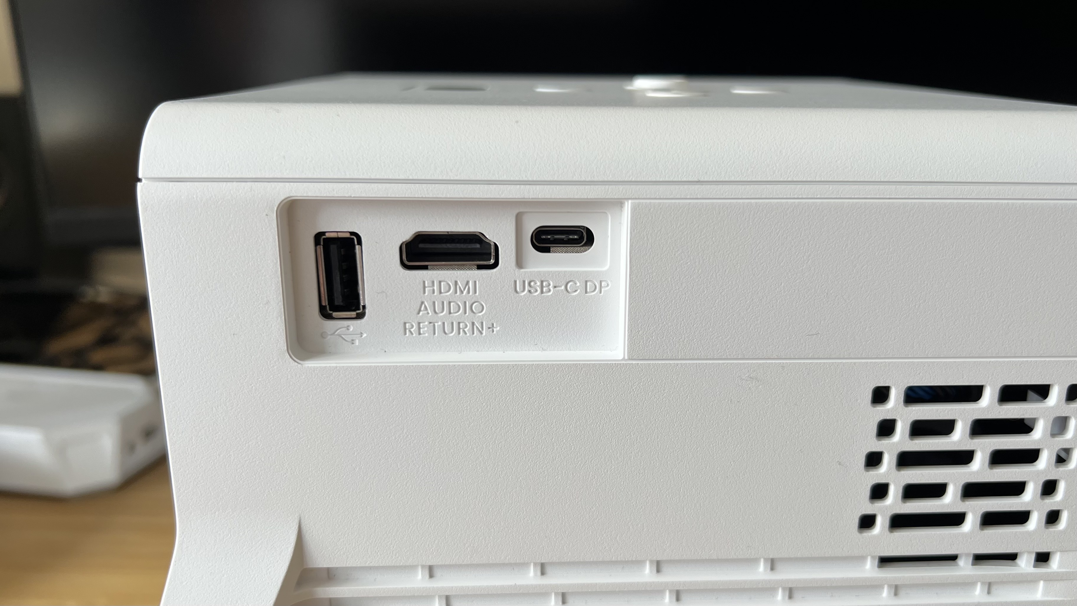 USB, HDMI, and USB-C ports on the side of the BenQ X300G projector