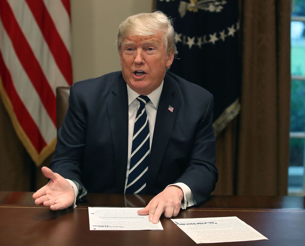 President Trump with documents.