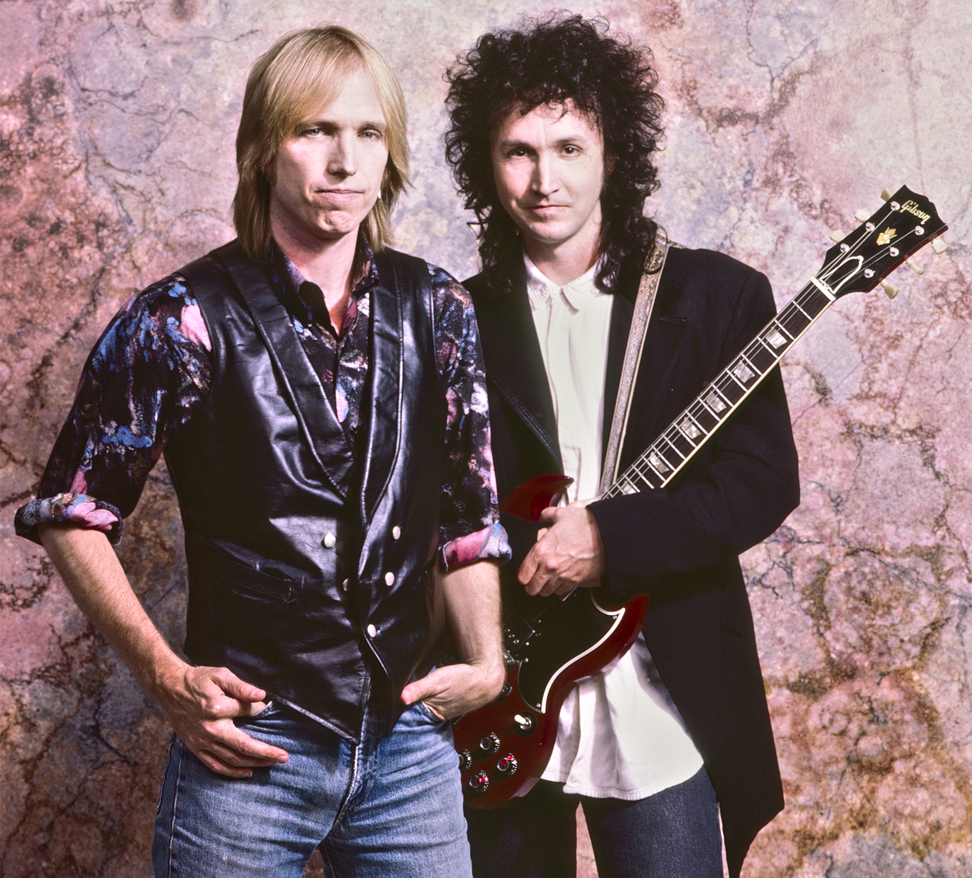 Tom Petty and Mike Campbell pose for a portrait in Hollywood, California, 1987