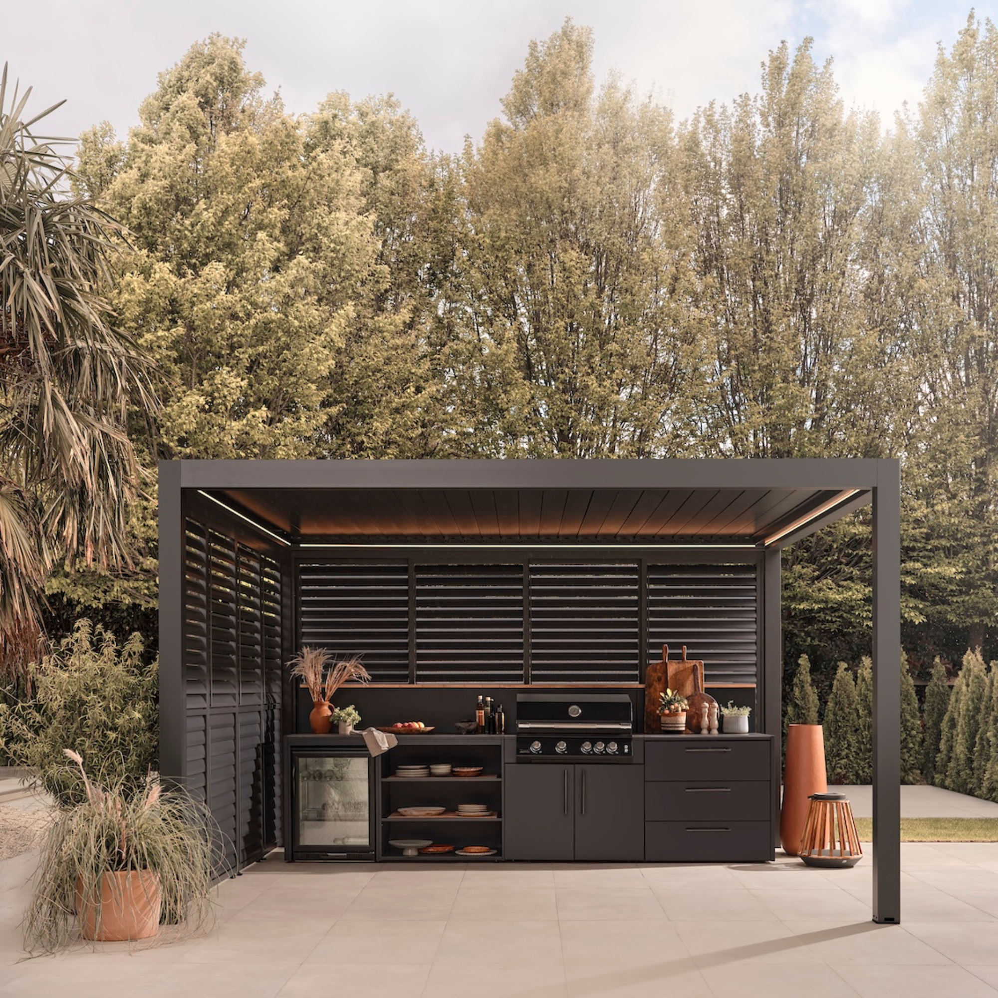 Black aluminium pergola featuring side panels