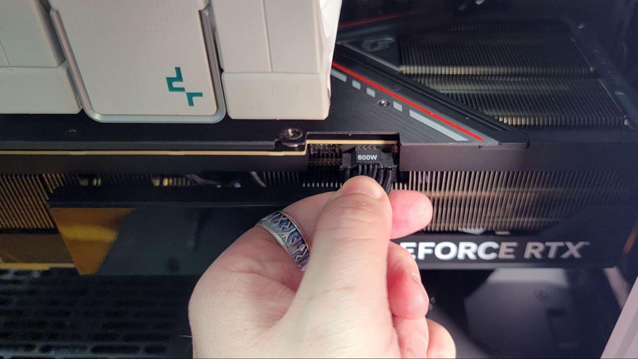 Plugging in the GPU power connector