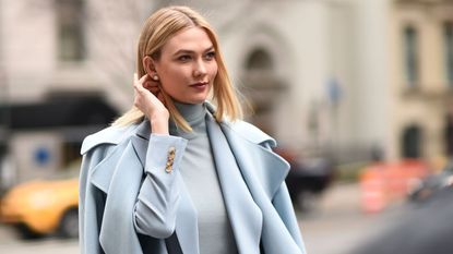 Karlie Kloss seen wearing all white as she leaves the Chrome