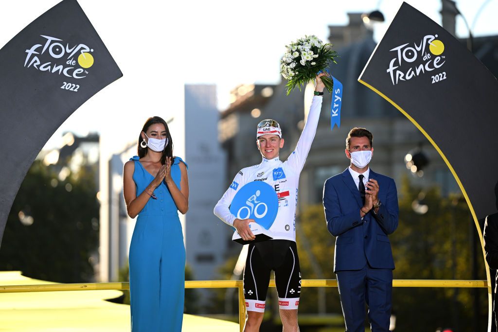 PARIS FRANCE JULY 24 Tadej Pogacar of Slovenia and UAE Team Emirates celebrates winning the white best young jersey on the podium ceremony after the 109th Tour de France 2022 Stage 21 a 1156km stage from Paris La Dfense to Paris Champslyses TDF2022 WorldTour on July 24 2022 in Paris France Photo by Dario BelingheriGetty Images