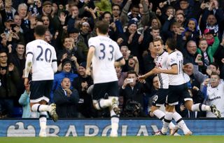 Harry Kane, second right. celebrates his second goal against Norwich in December 2015