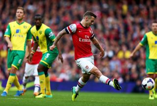 Jack Wilshere scores for Arsenal against Norwich in the Premier League in October 2013.