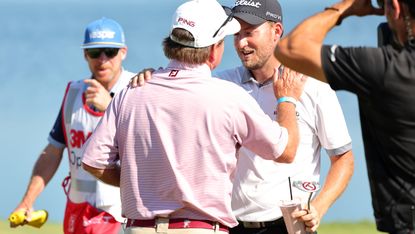 Lee Hodges get his milkshake on the 18th green from his old coach after winning the 3M Open