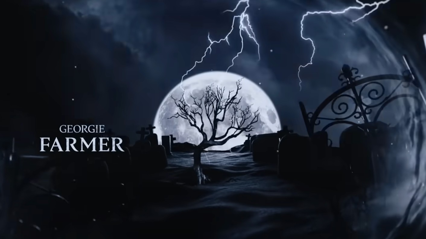The credit for Georgie Farmer is shown over a dark graveyard scene with a full moon and lightning