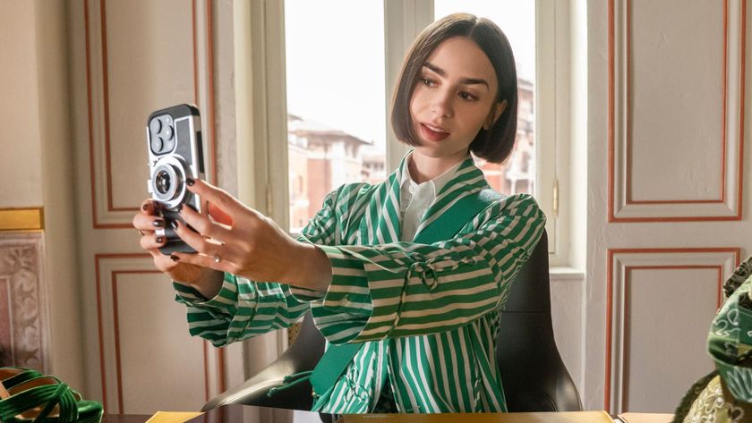 Lily Collins takes a selfie at a desk