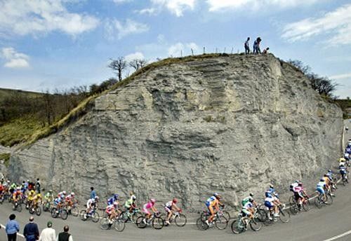 The peloton climbs