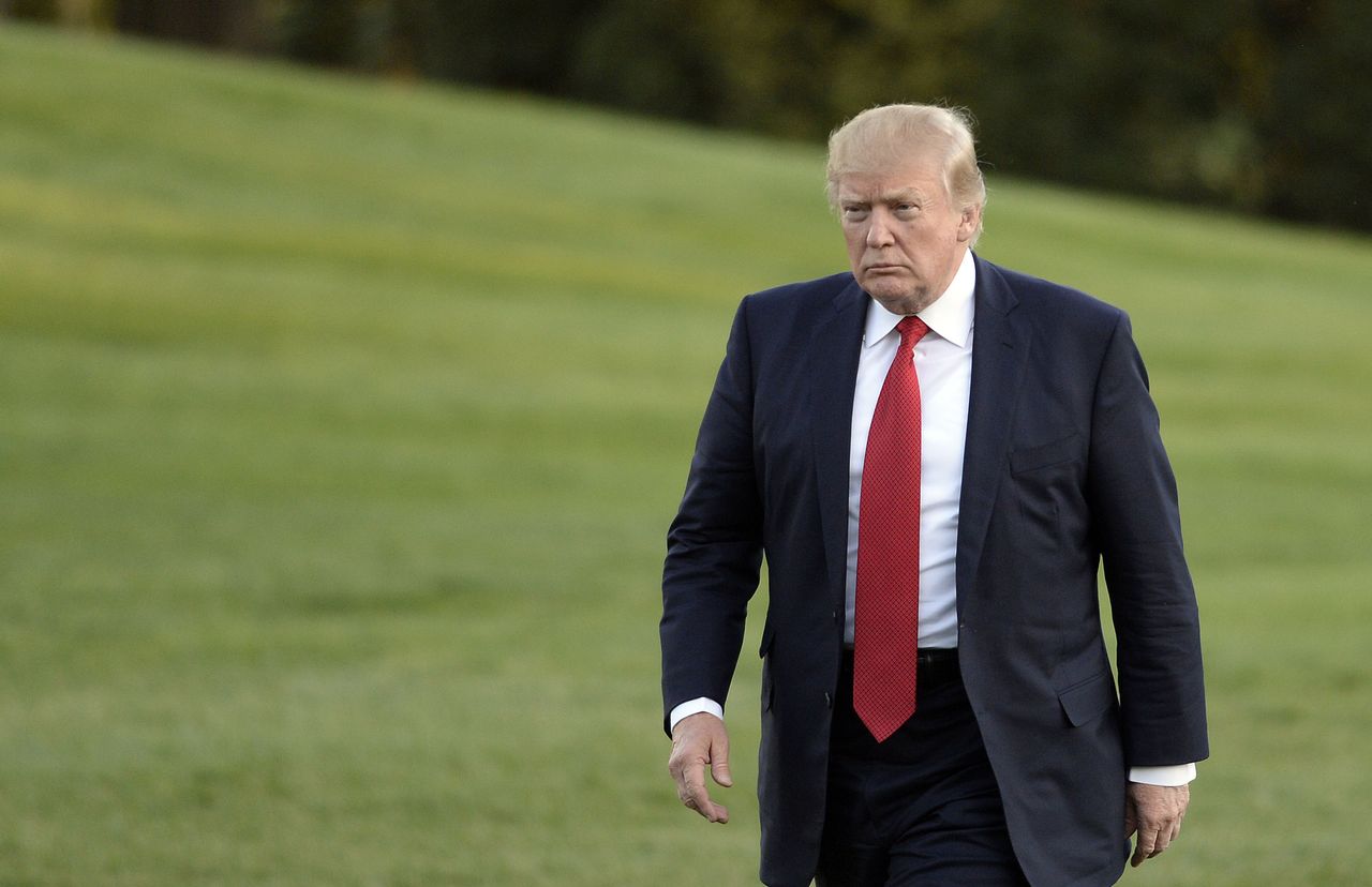 Donald Trump walks on the South Lawn