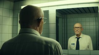 Jonathan Banks' Henry looks into a bathroom mirror in Apple's Constellation TV series
