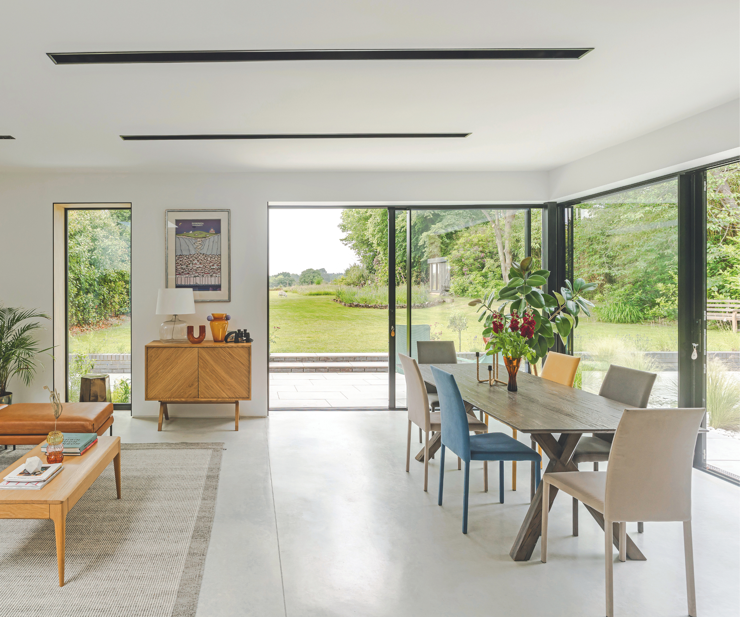 Bright dining room with patio doors overlooking the garden