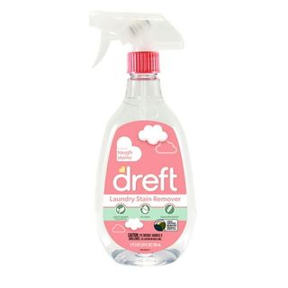 A clear spray bottle with a clear spray lid, a pink label on the front with Dreft branding. 