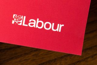 The UK's Labour Party logo printed on a red envelope