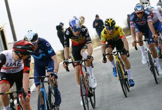 Wout Van Aert of Belgium and Team Jumbo - Visma, Primoz Roglic of Slovenia and Team Jumbo - Visma and Mathieu Van Der Poel of Netherlands and Team Alpecin-Fenix climbing the Poggio di Sanremo (160m) during the 113th Milano-Sanremo 2022 a 293km one day race from Milano to Sanremo / #MilanoSanremo / on March 19, 2022 in Sanremo, Italy. (Photo by Luca Bettini - Pool/Getty Images)