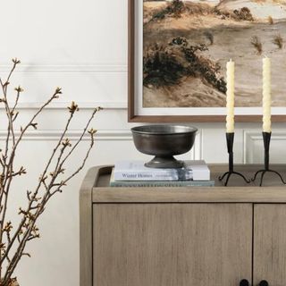 A small metal bowl on a console table from McGee & Co.