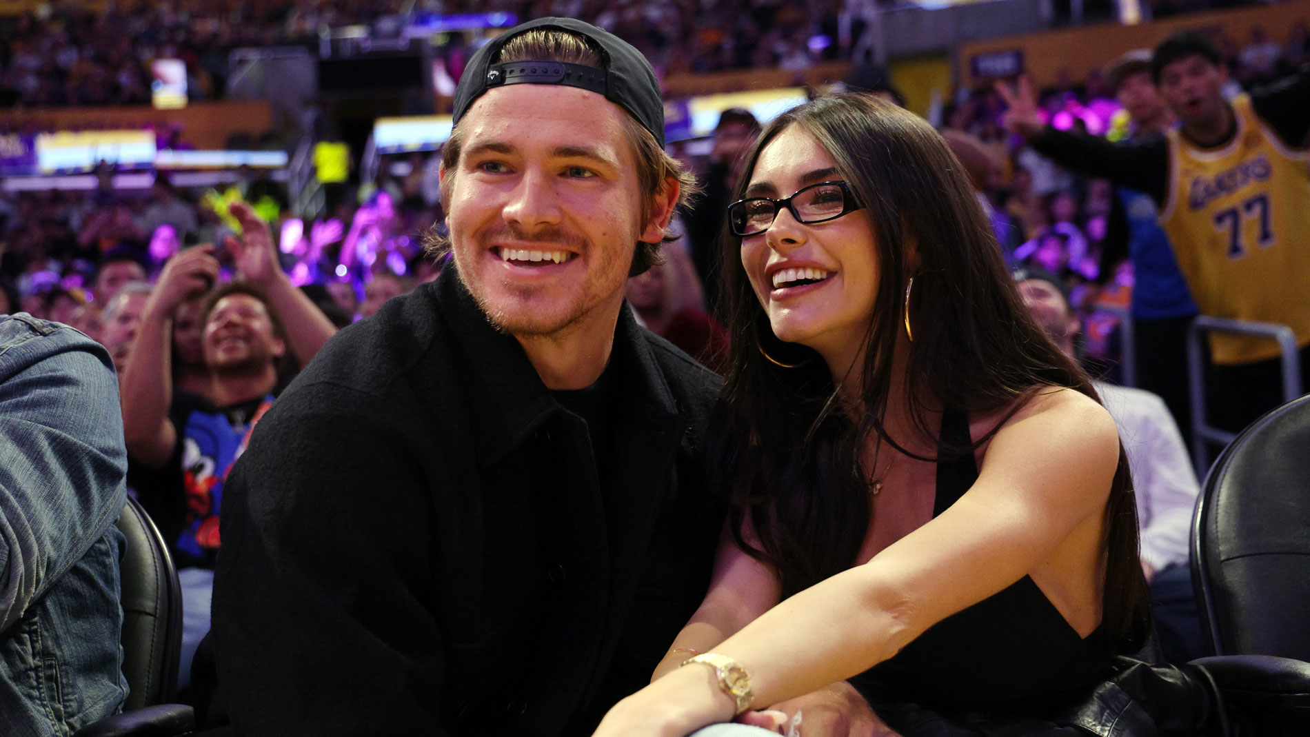 Madison Beer and Justin Herbert attend a Lakers game