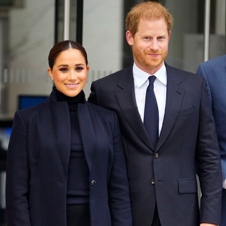 Prince Harry and Meghan Markle pose for the camera. Photo by Gotham / GC Images for Getty Images.