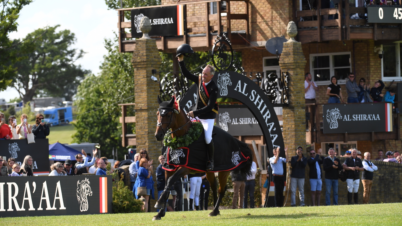 Shane Breen and Can Ya Makan on the lap of honour for the Hickstead Derby