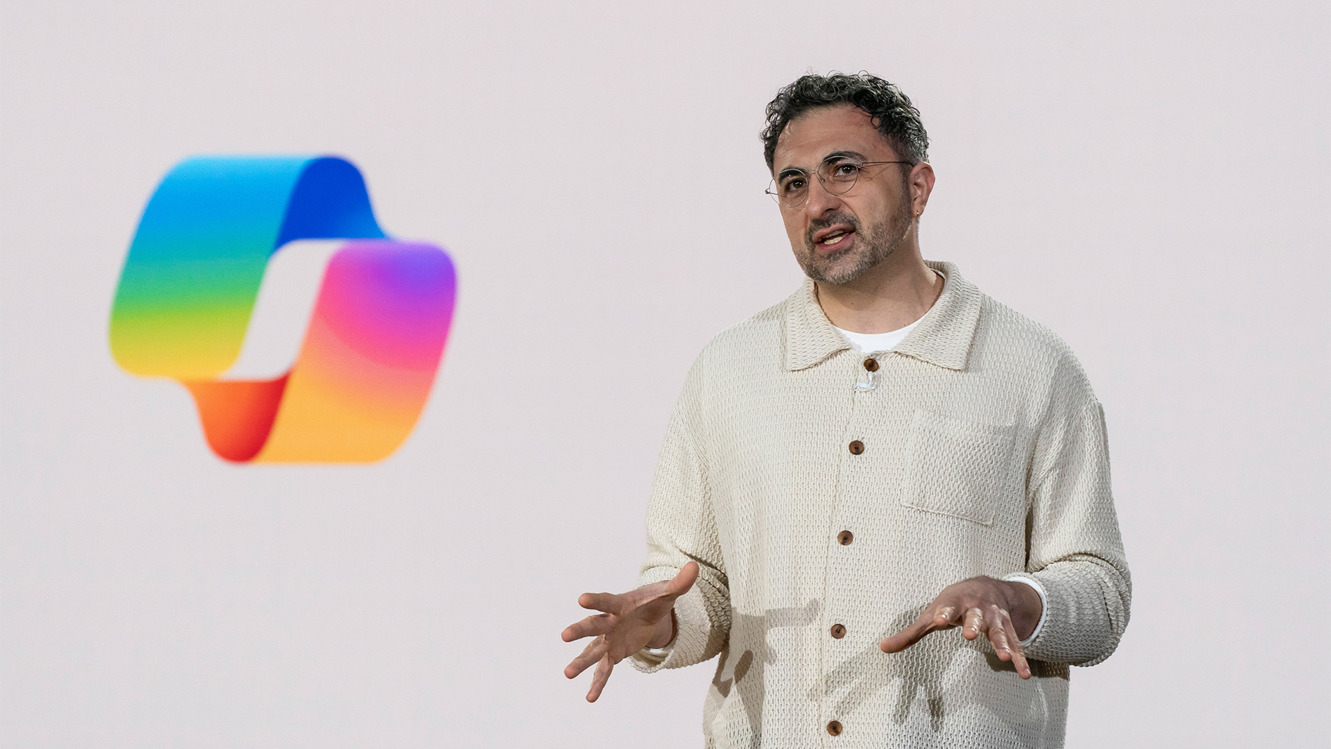 Mustafa Suleyman, CEO of Microsoft AI, pictured speaking on stage at the company's 50th anniversary event in Redmond, Washington state. 