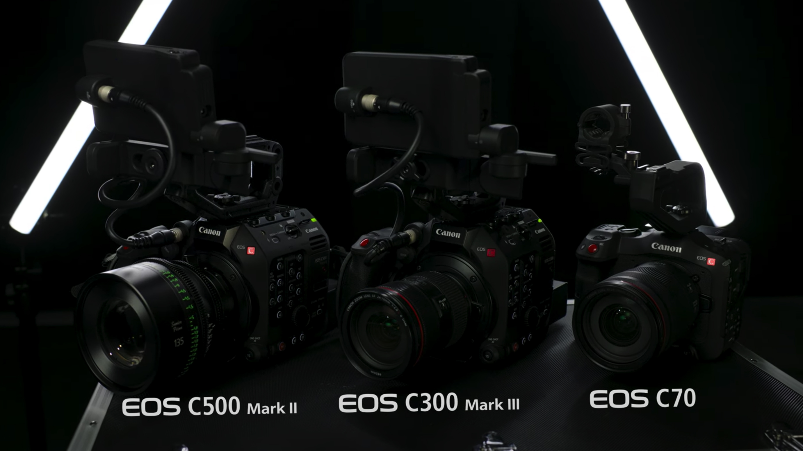 Three Canon EOS Cinema cameras on a flight case
