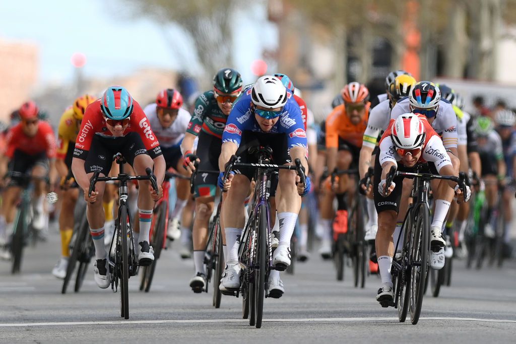 MOLINS DE REI SPAIN MARCH 25 EDITORS NOTE Alternate crop LR Maxim Van Gils of Belgium and Team Lotto Dstny Kaden Groves of Australia and Team AlpecinDeceuninck and Bryan Coquard of France and Team Cofidis sprint at finish line during the 102nd Volta Ciclista a Catalunya 2023 Stage 6 a 1741km stage from Martorell to Molins de Rei UCIWT on March 25 2023 in Molins de Rey Spain Photo by David RamosGetty Images