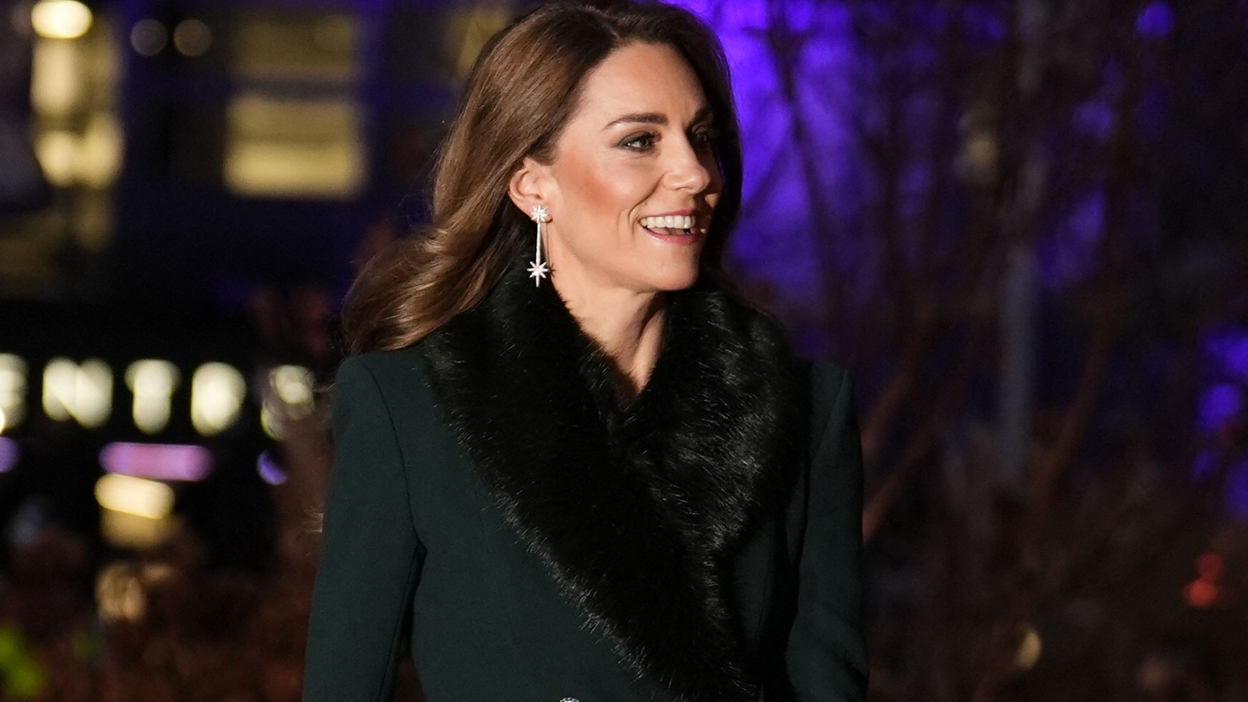 Kate Middleton dazzles in festive green coat with diamond earrings and cosy faux fur for Together At Christmas concert