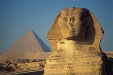 The Sphinx and one of the pyramids at Giza, Egypt.