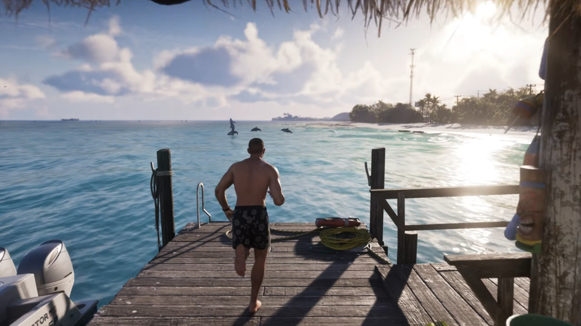 Jason dives off a pier in GTA 6 as dolphins leap up from the ocean's surface