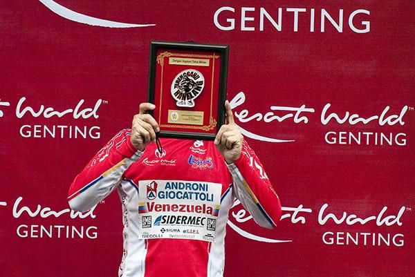 A shy Jose Serpa (Androni Giocattoli) is the leader of the King of the Mountains competition.