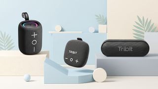 A selection of Tribit Bluetooth speakers on a pale background.