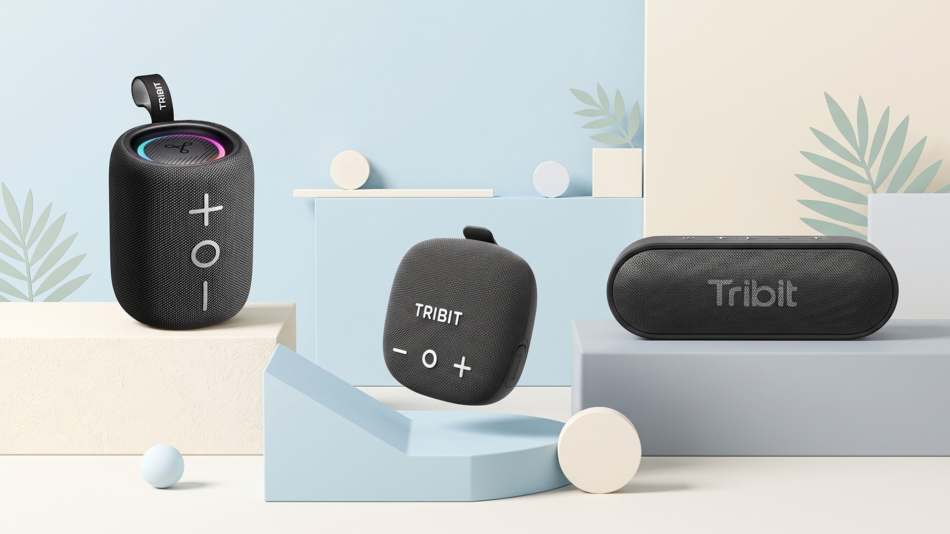 A selection of Tribit Bluetooth speakers on a pale background.