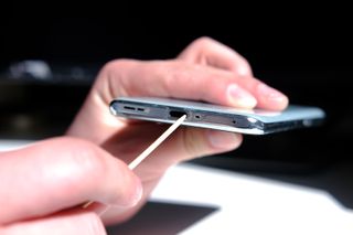 Cleaning a phone port with a toothpick