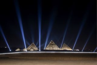 The pyramids in Egypt with Dior runway in front