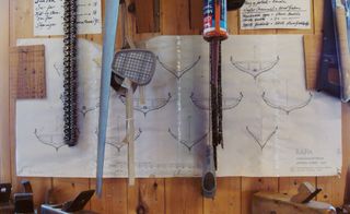 Technical plans hang on the walls of Ulk Mikalsen’s workshop, a traditional builder of Nordland boats