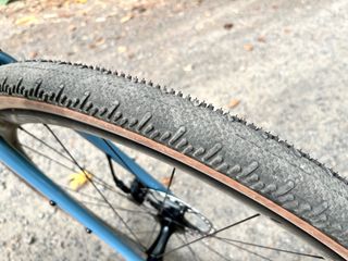 Image shows a gravel bike that's rolling on Schwalbe G-One RS tires