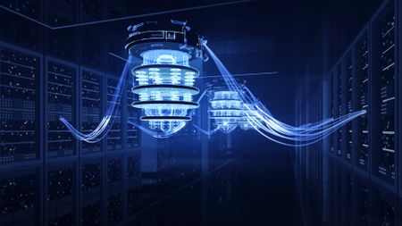 An illustration of a blue glowing chandelier of horizontal rings connected by vertical wires. Larger glowing wires connect this chandelier to shelves of glowing servers around the dark room