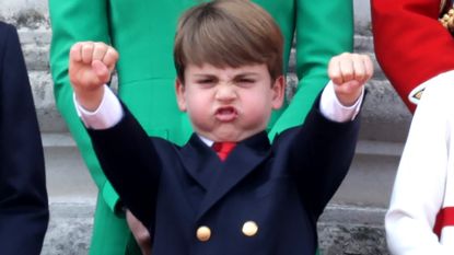 Prince Louis riding an imaginary motorcycle at Trooping the Colour