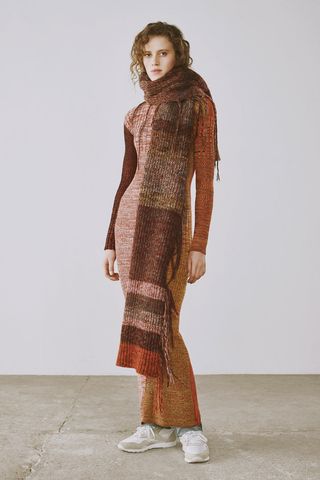 Model wears a agate coloured scarf, with matching jumper and trousers