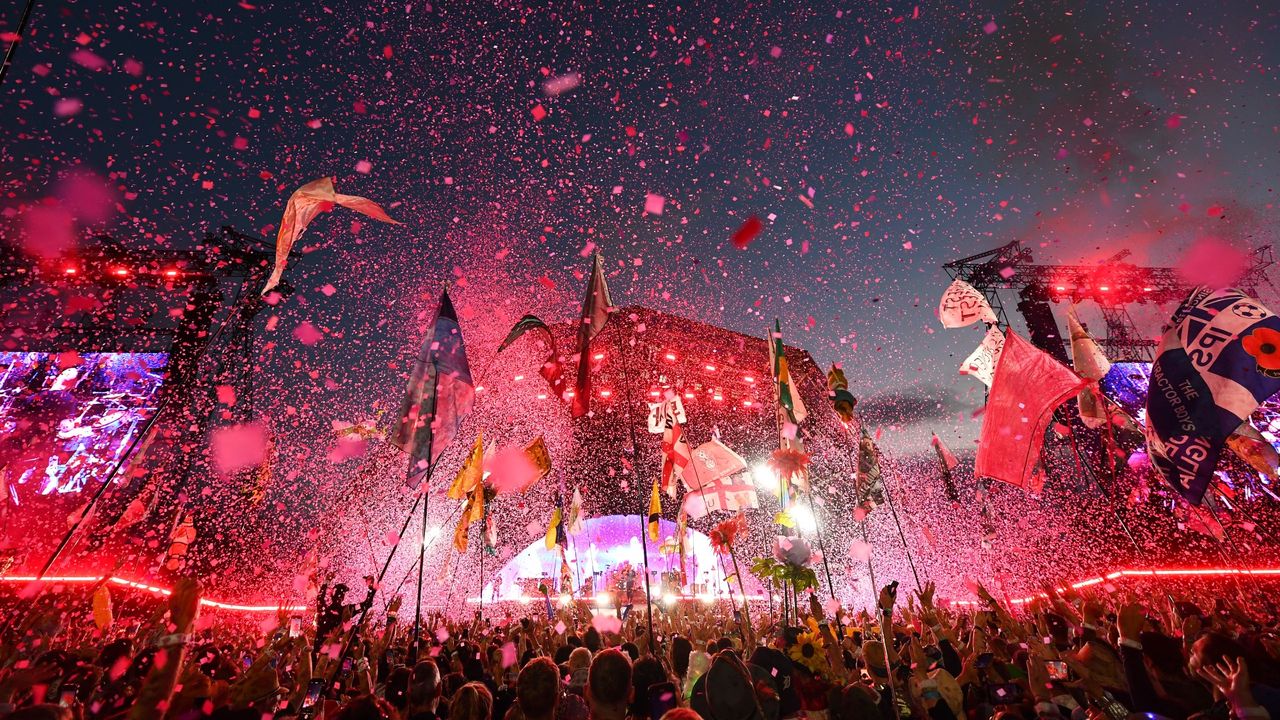 A massive crowd gathered to watch Coldplay&#039;s Saturday night set at Glastonbury. It was the fifth time the band have headlined the festival