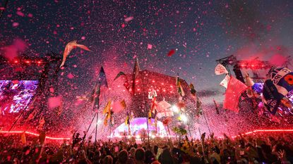 A massive crowd gathered to watch Coldplay's Saturday night set at Glastonbury. It was the fifth time the band have headlined the festival