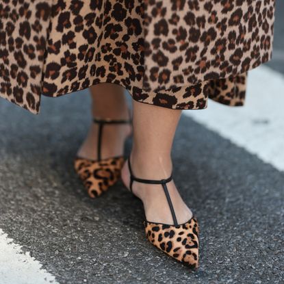 woman wearing leopard print shoes 