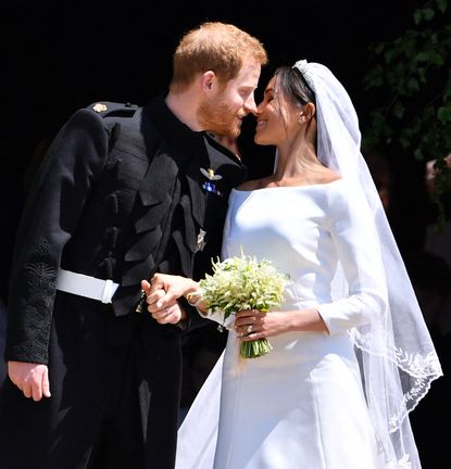 Meghan Markle and Prince Harry kissing on their wedding day