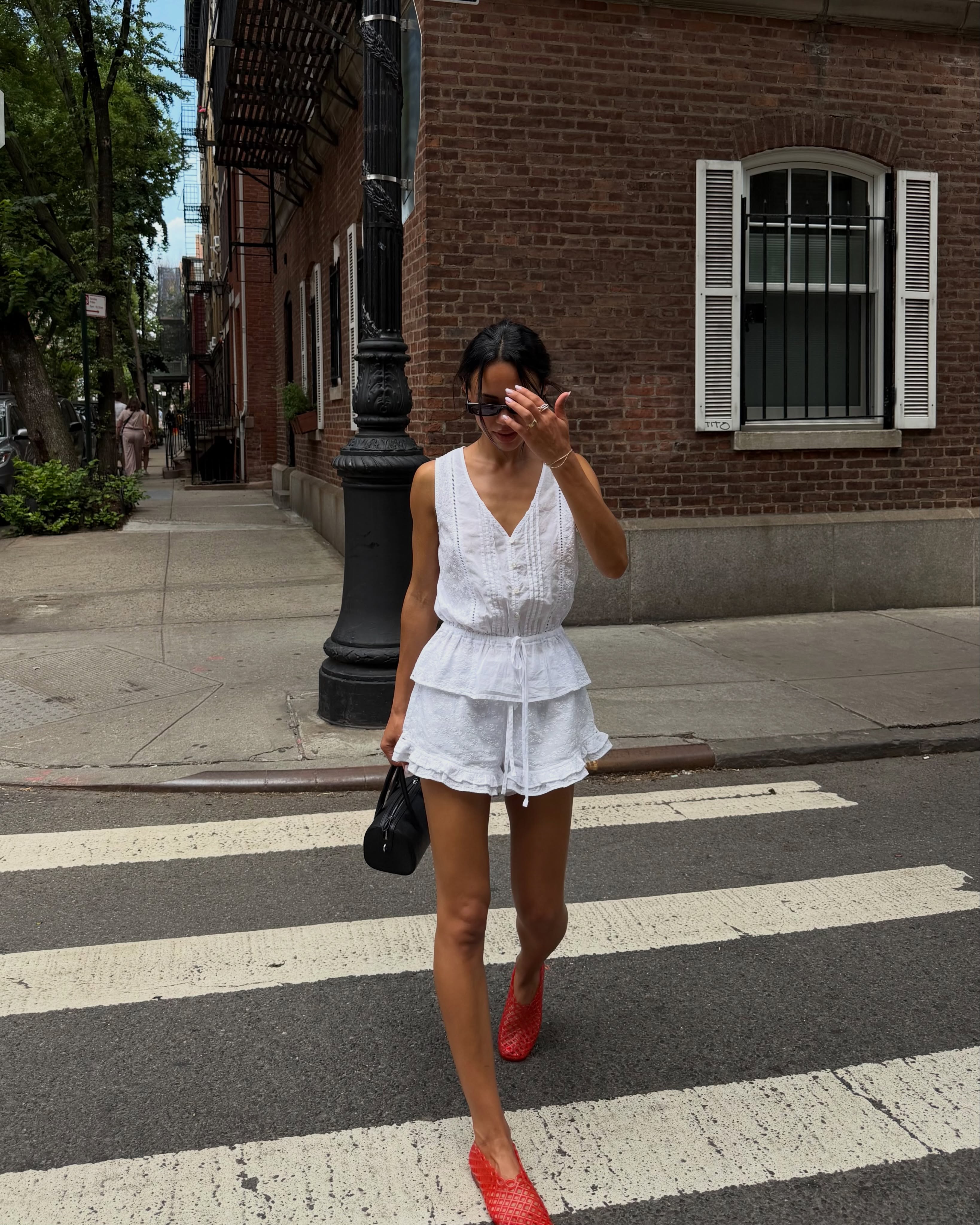 A woman wearing best white linen fashion item for summer 2026.