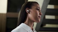 Picture of a woman wearing Sony WF-1000XM6 wireless earbuds in platinum silver